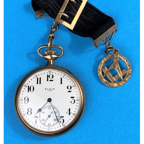 596 - An early 20th century open faced keyless pocket watch by Elgin on silk ribbon with 9ct hallmarked go... 