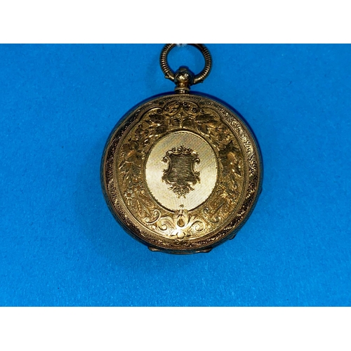 560 - A Continental yellow metal fob watch with extensive etched decoration and floral engraved dial st. 1... 