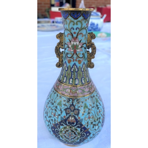 363 - A Chinese highly detailed Cloisonne vase in the Qing manner with light blue group and various other ...