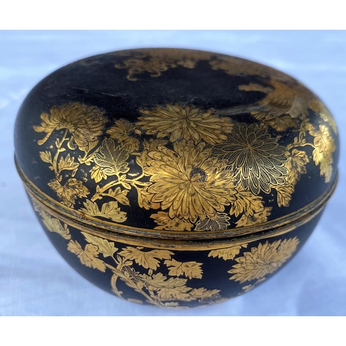 375 - A Japanese Meiji period gilt and matt black metal lidded pot with finely detailed decoration of chry... 
