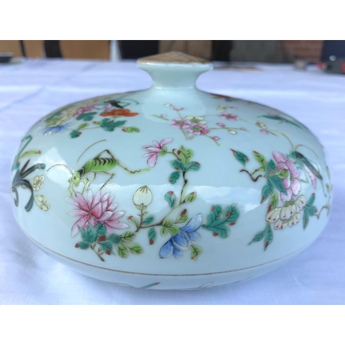 345G - A Chinese famille rose shallow lidded bowl with internal divisions, decorated with flowers and insec... 