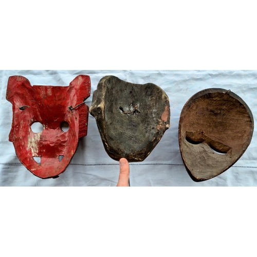 176 - Three various carved wooden masks