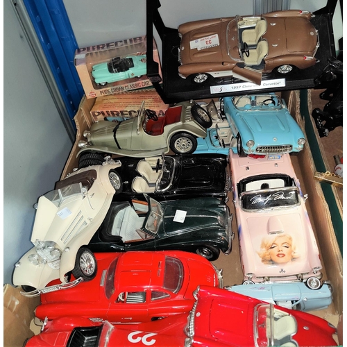 33 - A collection of vintage cars and other models