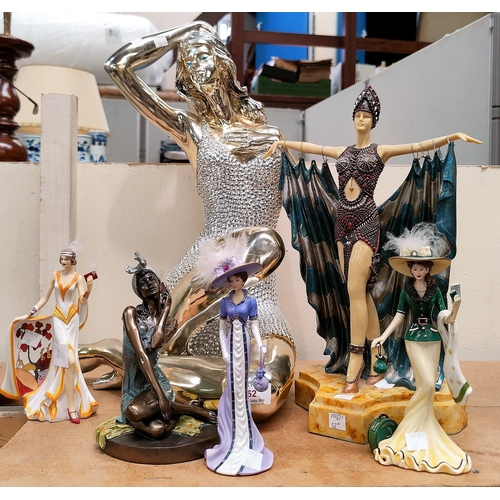 52 - A 1970's style silvered figure of a woman, 52 cm; an Art Deco figure by Leonardo; and others