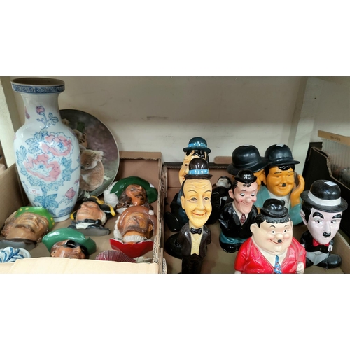 61 - A selection of Laurel & Hardy figures various plaster wall plaques etc