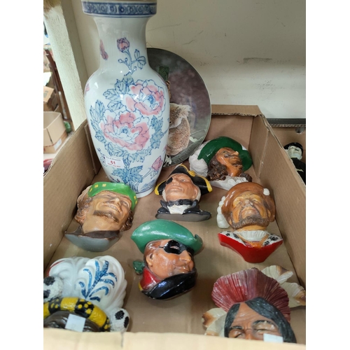 61 - A selection of Laurel & Hardy figures various plaster wall plaques etc