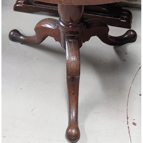 721 - A 19th century oak occasional table with circular drop leaf on top of pedestal base