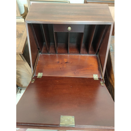 724 - A narrow inlaid mahogany fall front bureau with 3 drawers under