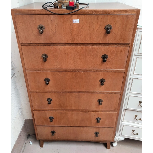 733 - A 1950's walnut 6 height chest of drawers