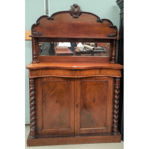 790 - A Victorian mahogany chiffonier with serpentine front double cupboards bellow, barley twist supports... 