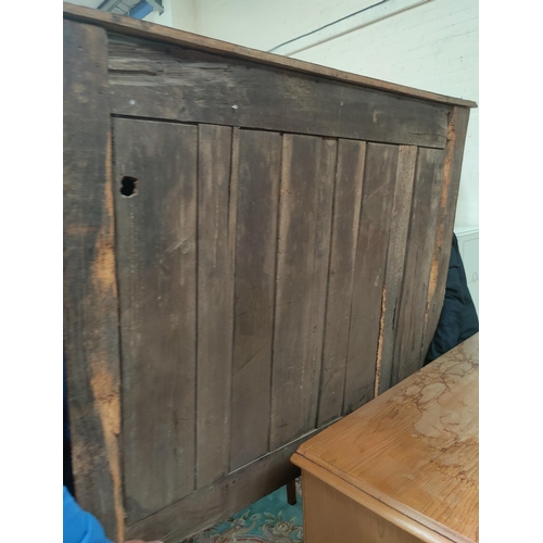 792 - An 18th/19th century oak panelled double door dole cupboard 126x46x125 cm
(back panel a.f)