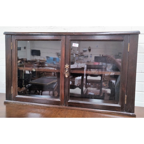 801 - An oak table top double glazed door display cabinet
52 x 90 x 25cm