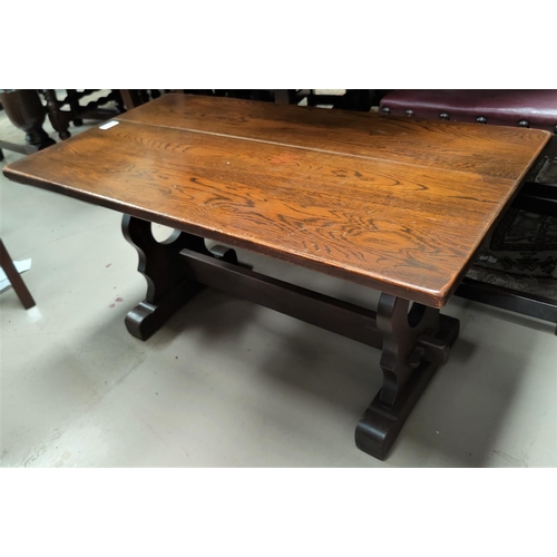 816 - An oak refectory style coffee table