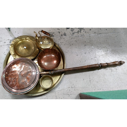 83 - A copper warming pan; a large flat copper pan; metalware