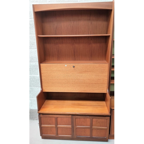 836 - A 1960's teak wall unit with fall front writing section