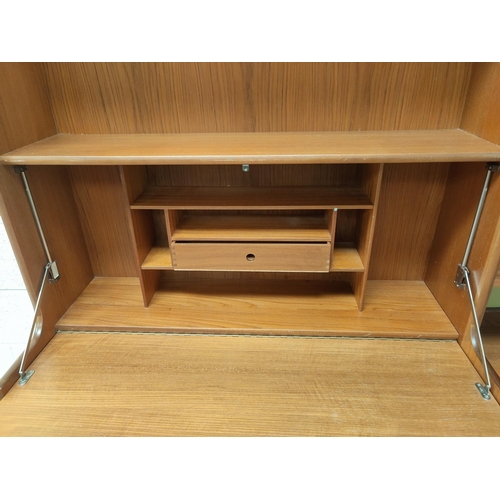 836 - A 1960's teak wall unit with fall front writing section