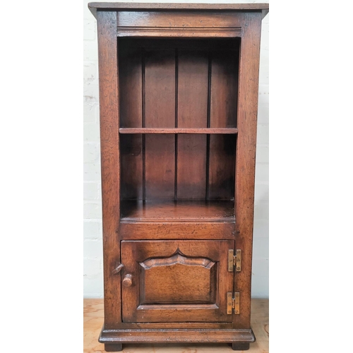 842 - An 18th century style distressed oak 2 height dwarf bookcase with cupboard under in the Titchmarsh &... 