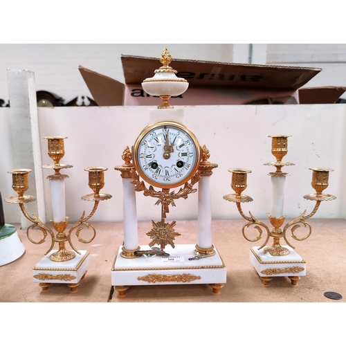98 - A Louis XVI style 3 piece clock garniture in ormolu and white marble, the central drum clock with va... 