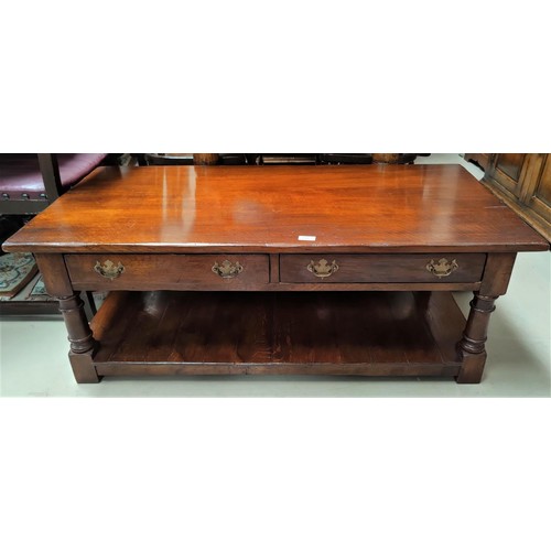 810 - An oak Titchmarsh & Goodwin style coffee table with two drawers and shelf below.  121cm X 61cm