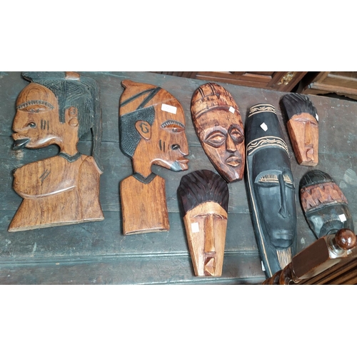 103 - Seven various African tribal masks, wall hanging