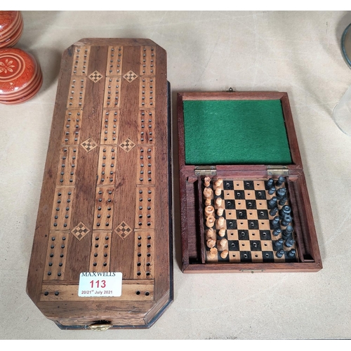 113 - A Victorian playing card box with inlaid decoration, 33 cm; a travelling chess set in mahogany box