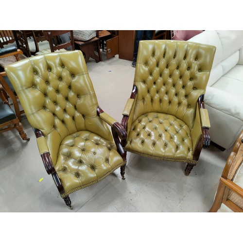 683 - A Regency style pair of mahogany armchairs in deeply buttoned old gold hide