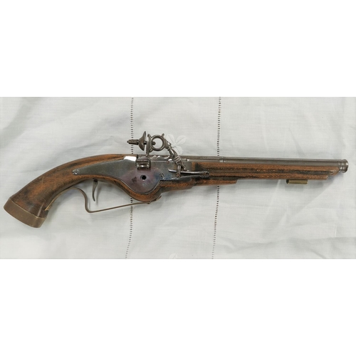 167 - A reproduction wheel lock pistol model with wooden stock with plated fitting for display purposes on... 