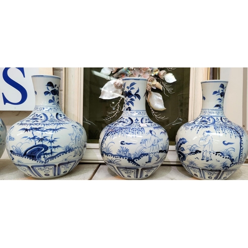 350a - A modern Chinese globular blue and white vase with mountain scene, three other similar matching mode... 