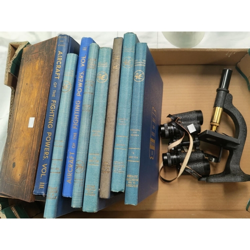 185 - A cased student's bench microscope, a pair of field glasses, six volumes of Aircraft of Fighting Pow... 