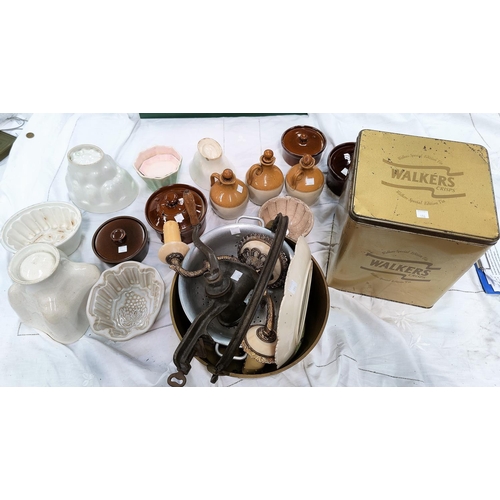 186 - A selection of stoneware jelly moulds, stoneware bottles, Walkers tin, brass jam pan, metalware etc