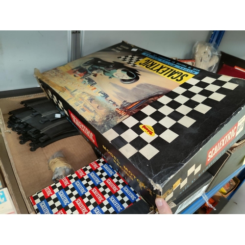 293 - A large selection of Scalextric including card, track and accessories, some boxed