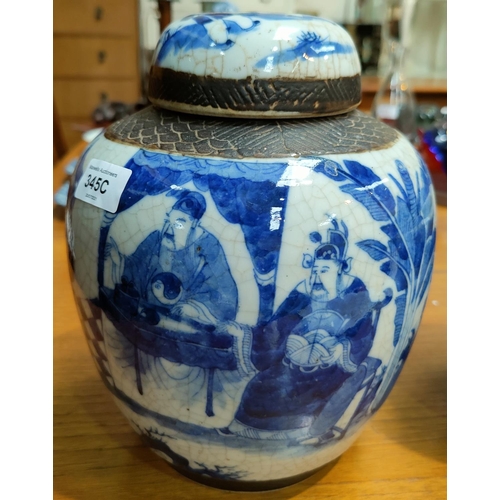 345C - A Chinese blue and white crackle glaze ginger jar showing scholars and with bark effect decoration t... 