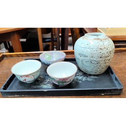 364B - Two Chinese tea bowls, one with red bamboo panels, another with a traditional scene, both with seal ... 