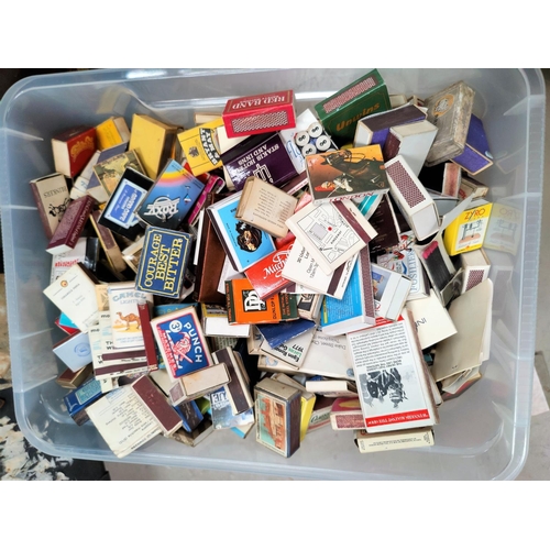 21 - A large collection of matchbooks and packs in vintage hat boxes