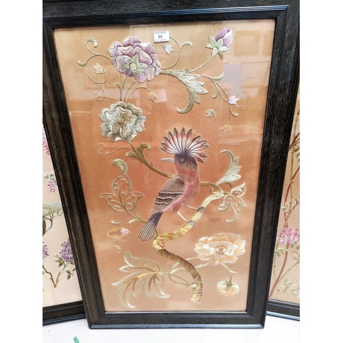 80 - Three early 20th Chinese large embroidered silk pictures, birds in trees, framed and glazed