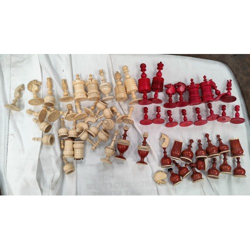 299 - Two antique bone carved red and white chess sets