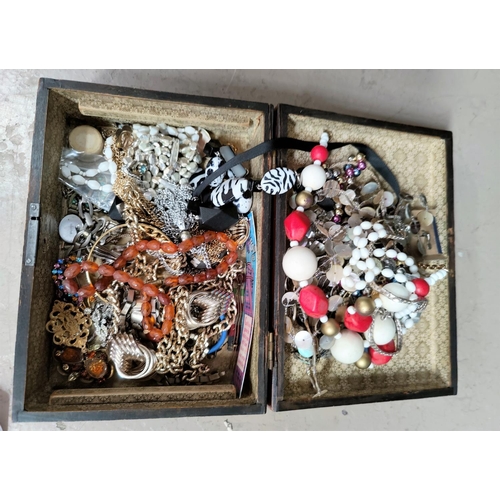 529 - A selection of vintage costume jewellery, etc., contained in a wooden box