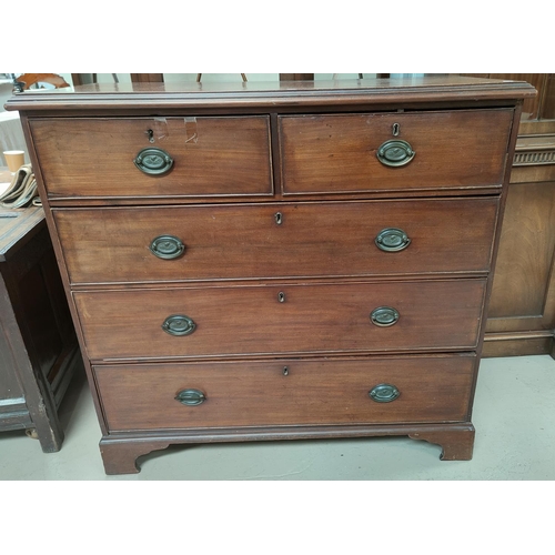 815 - A Georgian mahogany chest of two short and three long drawers (cut down) on bracket feet