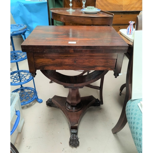 795 - A 19th century rose wood fold out writing table with fitted drawer beneath, U shaped support with ca... 