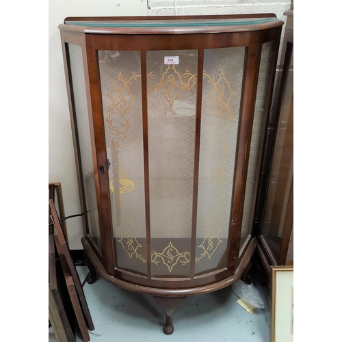 805 - A 1950's walnut demi-lune display cabinet