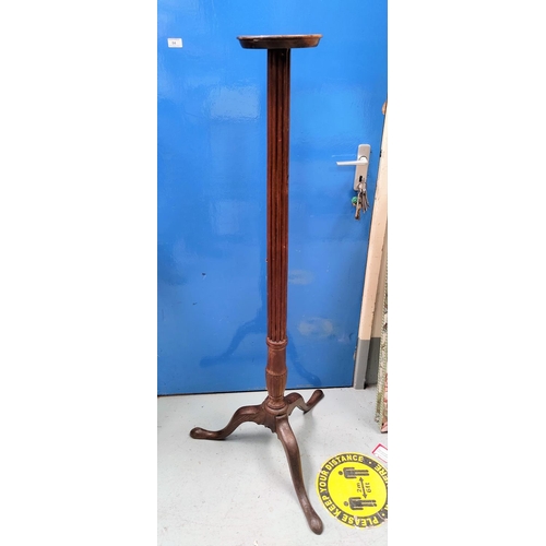 806 - A late 19th century oak torchere with reeded column on three splayed feet, an American rocking chair... 