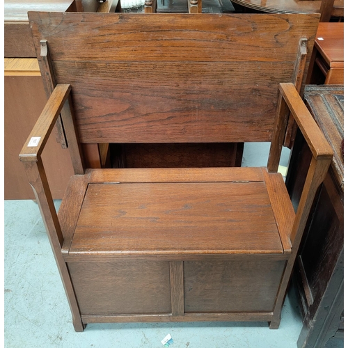 807 - A mid 20th century small oak monks bench, length 30