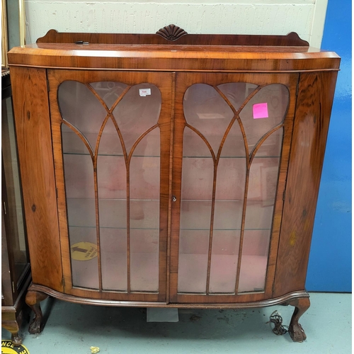 808 - A 1930's 'D' front 2 door display cabinet on ball and claw feet