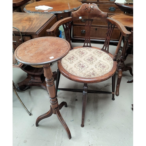 829 - An Edwardian stained mahogany tub shaped armchair and a wine table