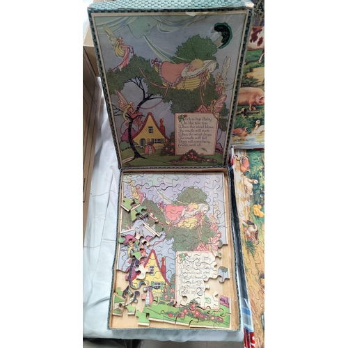 309 - 2 vintage wooden jigsaws, boxed (not guaranteed complete)