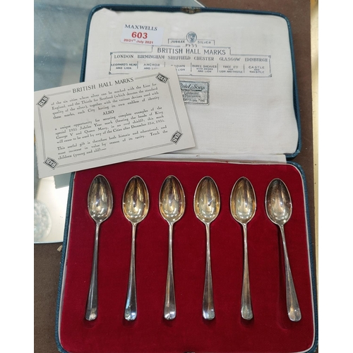603 - A cased set of six British hallmarked silver spoons from the 1935 Jubilee each with a different assa... 