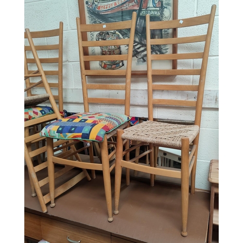 692 - An Ercol pair of dining chairs in lightwood and elm, with stick backs; a modern set of 4 ladder back... 