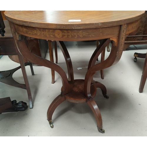 705 - A circular Edwardian mahogany occasional table with extensive inlaid decoration on 4 square legs and... 