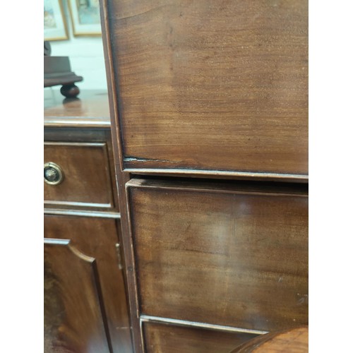 815 - A Georgian mahogany chest of two short and three long drawers (cut down) on bracket feet