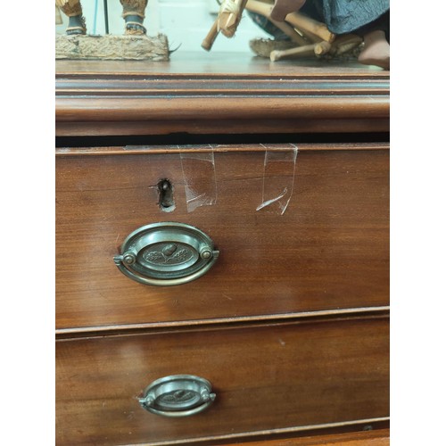 815 - A Georgian mahogany chest of two short and three long drawers (cut down) on bracket feet